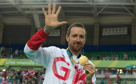 ДАМПУУРЛАА ЗАРЛАСАН НЭРТ ДУГУЙЧИН БРЭДЛИ УИГГИНС МӨНГӨ ОЛОХЫН ТУЛД ОЛИМПЫН МЕДАЛИУДАА ДУУДЛАГА ХУДАЛДААНД ОРУУЛНА